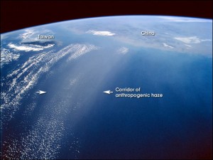 Colour photograph showing a coherent corridor of anthropogenic (man-made) haze, approximately 200 Km wide, over the East China Sea. This photograph was taken from the U.S. Space Shuttle, on 4th March 1996.