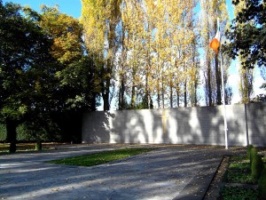 Colour photograph showing the last resting place, in Arbour Hill Cemetery Dublin, for many - not all - Executed Leaders of the 1916 Revolution. The Memorial was designed by G. McNicholl. Photograph taken by CJ Walsh. 2010-10-24. Click to enlarge.