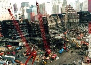Colour photograph showing advanced clean up operations at the World Trade Center Complex after 11 September 2001. Fires continued to smoulder for weeks after the Incident. Click to enlarge.