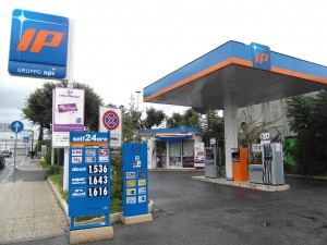 Colour photograph showing the prices of different grades of petrol and diesel at a Petrol Station in Rome's Ciampino Airport, in Italy. Photograph by CJ Walsh. 2011-10-26. Click to enlarge.