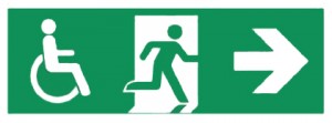 Colour image showing an Accessible Fire Evacuation Route Sign. From now on, Building Users should expect that these routes will be Accessible-for-All, throughout their full extent, until they reach a Place of Safety which is remote from the Building. Otherwise, they will be able to find accommodation in a suitable Area of Rescue Assistance along the route. Click to enlarge.