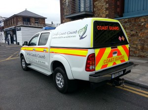 Irish Coast Guard Vehicle, with High Visibility Markings, at Howth Harbour in Dublin.